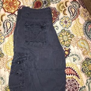 Men’s navy blue cargo shorts.